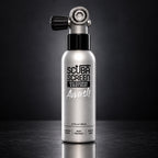 AWASH hair and body wash on a dark studio background